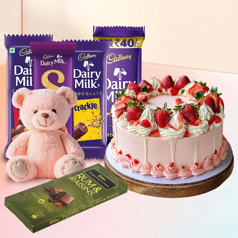 A delightful combo featuring a strawberry cake, various Cadbury chocolates, and a cute teddy bear. Perfect for celebrating special moments.