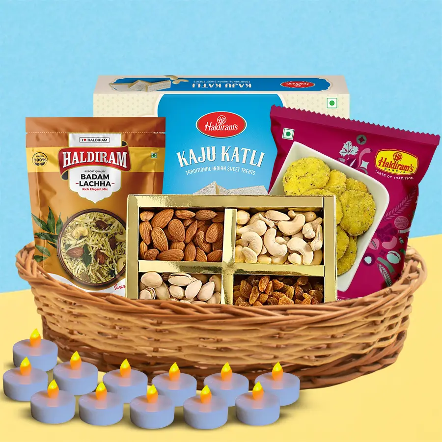 Diwali Snack Extravaganza Gift Set with assorted treats and LED candles in a decorative basket.