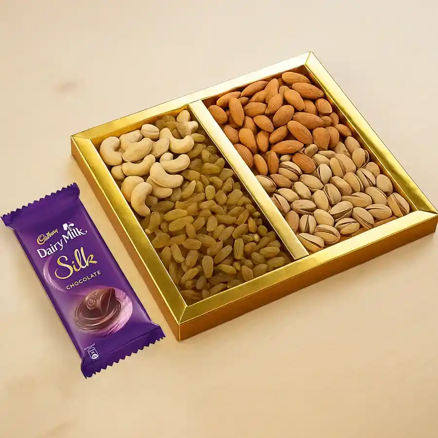 A gift set featuring healthy dry fruits and Cadbury Dairy Milk Silk chocolate, perfect for Mother's Day.