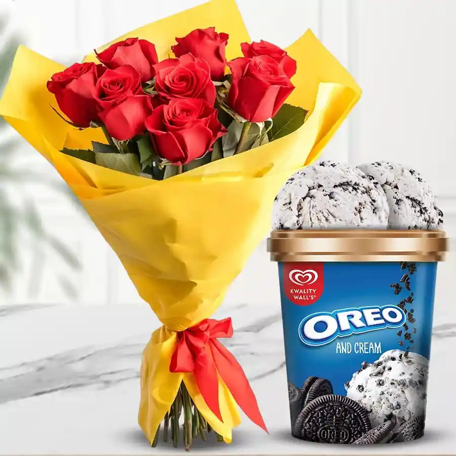 A bouquet of ten red roses beside a tub of Oreo ice cream from Kwality Walls, symbolizing love and celebration.