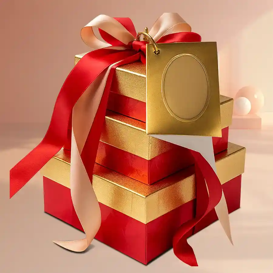 Three stacked boxes of handmade chocolates, overflowing with assorted crunchy treats, presented as a Special Chocolate Tower Triplet.