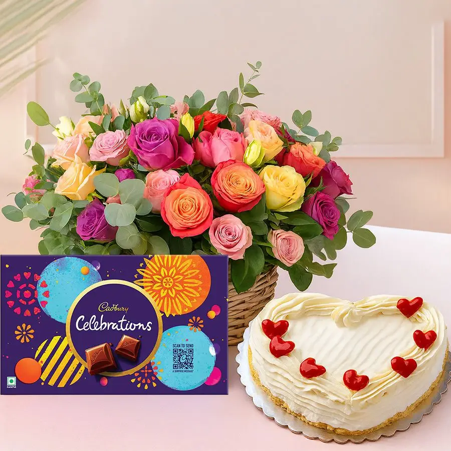 Heartfelt floral combo featuring assorted roses, heart-shaped vanilla cake, and Cadbury chocolates.