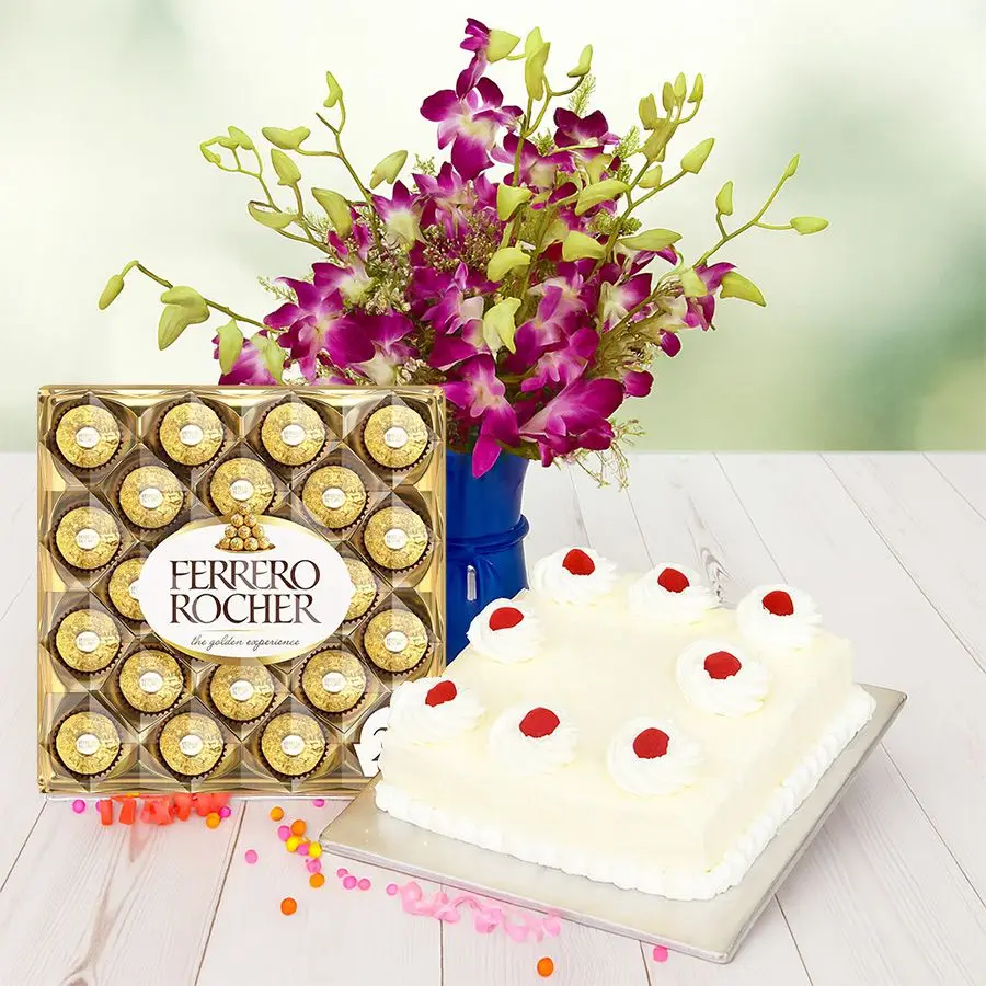 Elegant arrangement of purple orchids with a White Forest Cake and Ferrero Rocher chocolates, ideal for celebrations.