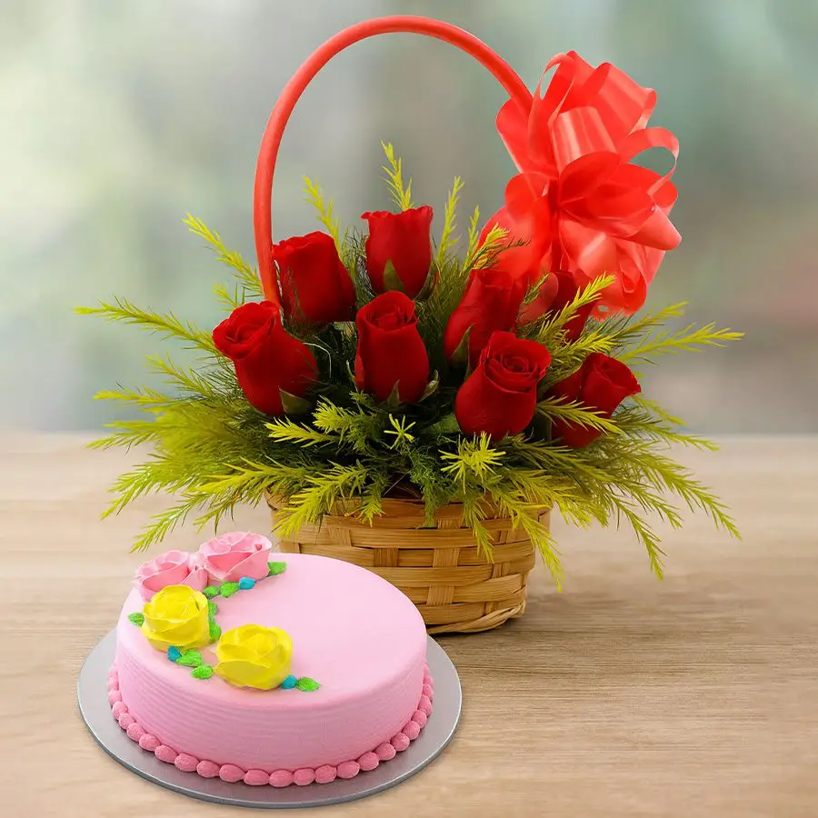 Elegant basket containing 12 red roses and a round vanilla cake.