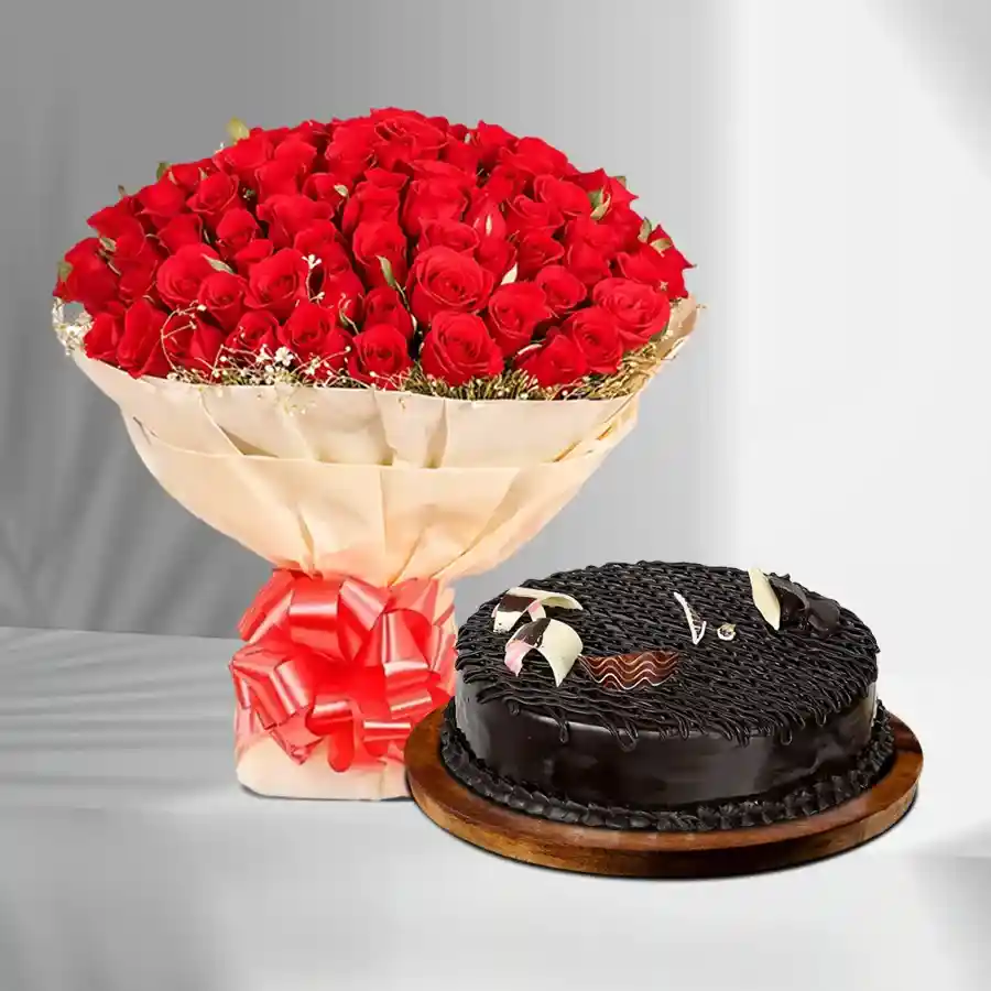 A beautiful bunch of red roses alongside a round chocolate cake, perfect for gifting on special occasions.
