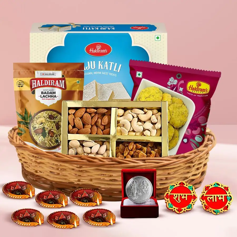 Diwali Dry Fruits with Sweets and Snacks Hamper featuring assorted treats, designer diyas, and a silver-plated Ganesh Lakshmi coin.