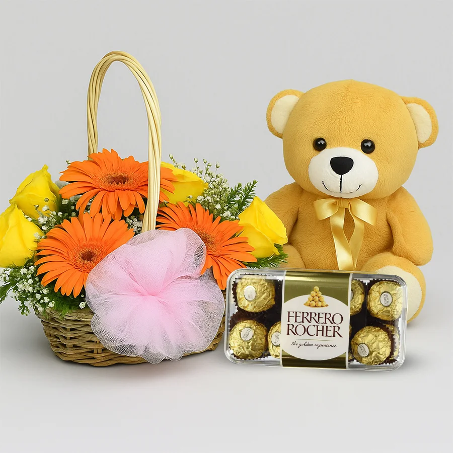 Brown teddy bear with mixed flower basket and Ferrero Rocher chocolates.