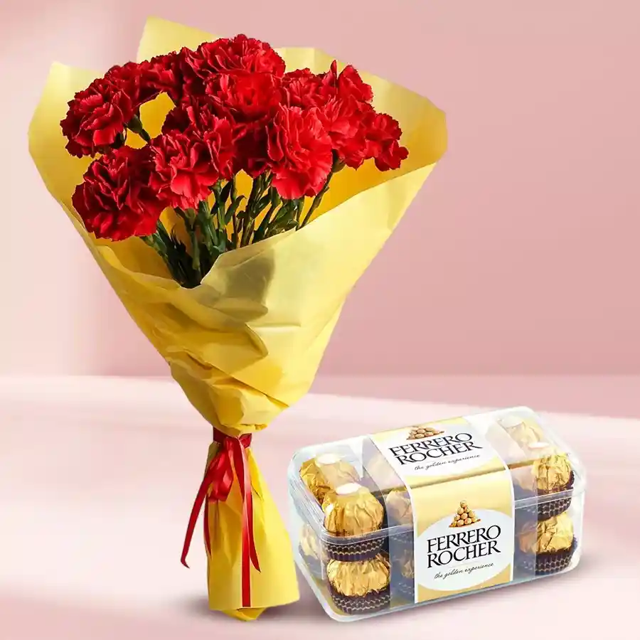 A vibrant bunch of 15 red carnations paired with a box of 16 Ferrero Rocher chocolates, perfect for gifting.