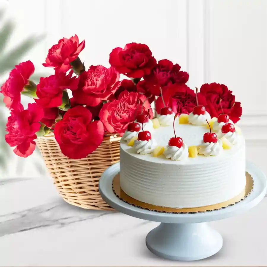 Gorgeous red carnations in a basket paired with a half-kilogram pineapple cake.