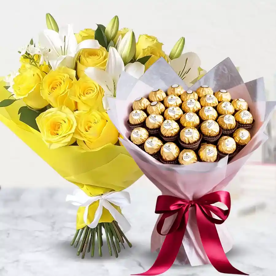 Bouquet of yellow roses and white lilies with Ferrero Rocher chocolates.