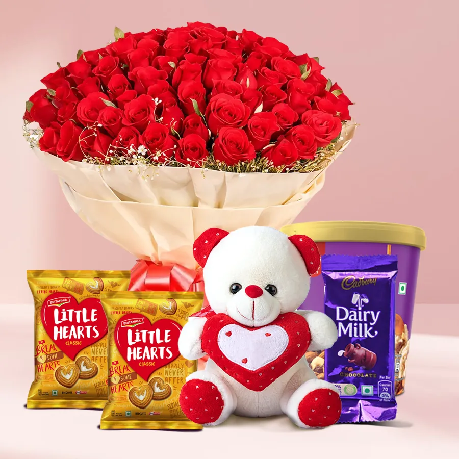 Breathtaking gift combo with roses, ice cream, cookies, and a teddy bear.