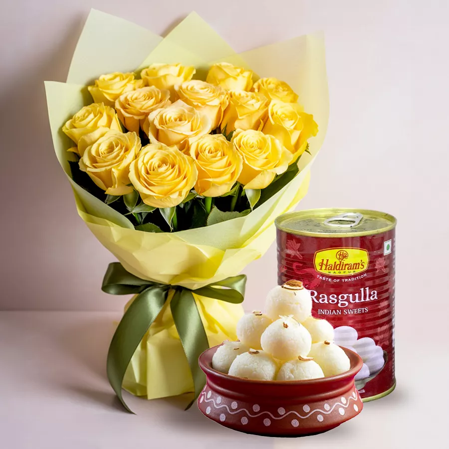 A bouquet of ten yellow roses paired with a 1 kg pack of Haldiram Rasgulla, perfect for Mother's Day celebrations.