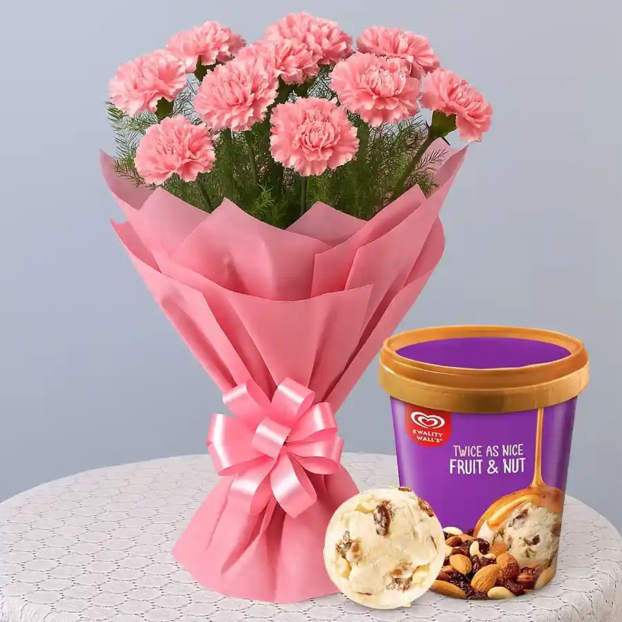 A vibrant bouquet of 10 pink carnations alongside a 700g tub of Kwality Walls Fruit n Nut Ice-Cream for Mother's Day gifting.