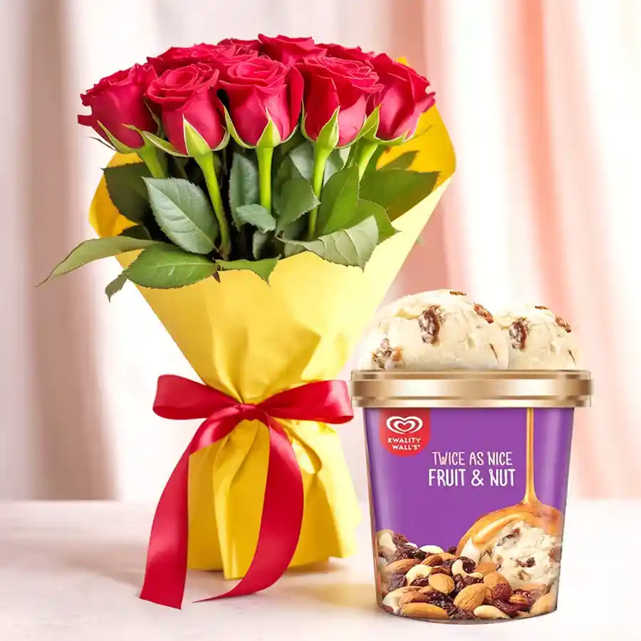 A stunning bouquet of 8 red roses alongside a tub of Kwality Walls Fruit n Nut Ice-Cream, ideal for expressing love on Mother's Day.