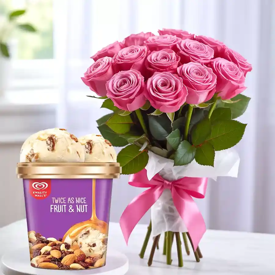 A bouquet of pink roses alongside a tub of Kwality Walls Fruit n Nut Ice-Cream, ideal for Mother's Day celebrations.