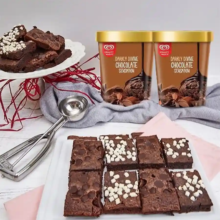 Eight chocolate brownies and two packs of Kwality Walls chocolate ice cream for Mother's Day.