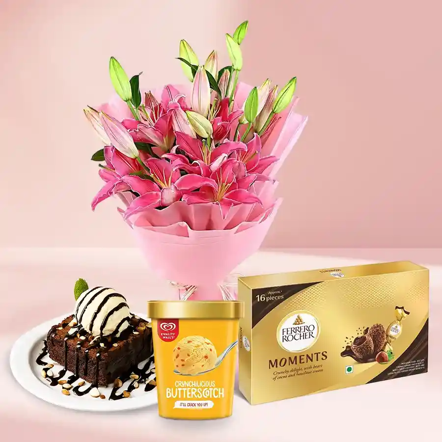 A stunning combo featuring pink lilies, chocolate brownies, butterscotch ice cream, and Ferrero Rocher chocolates for Mother's Day.