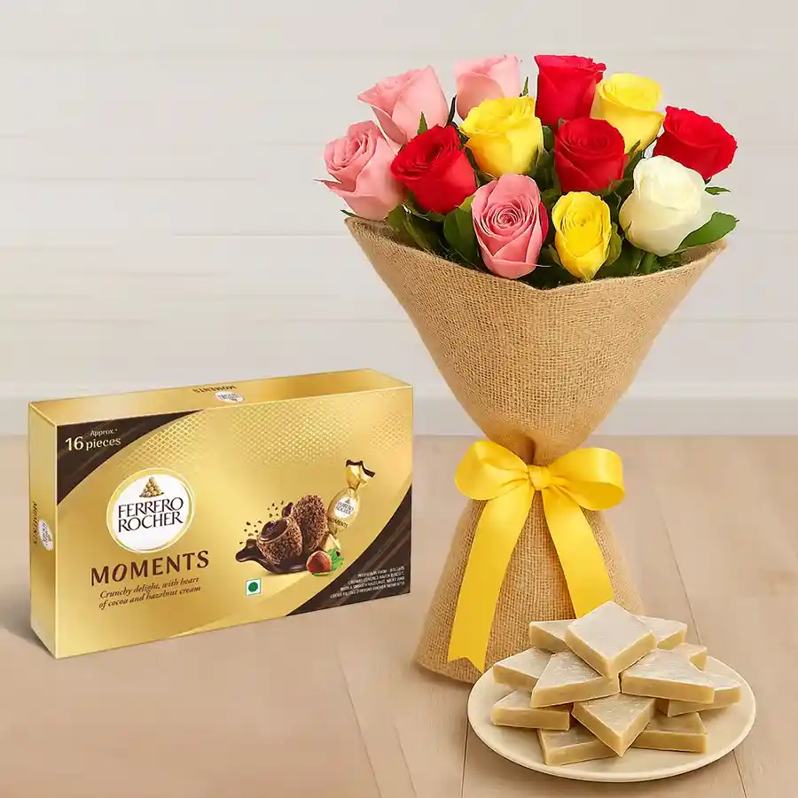 A beautiful bouquet of mixed roses with Kaju Barfi and Ferrero Rocher chocolates, perfect for Mother's Day.