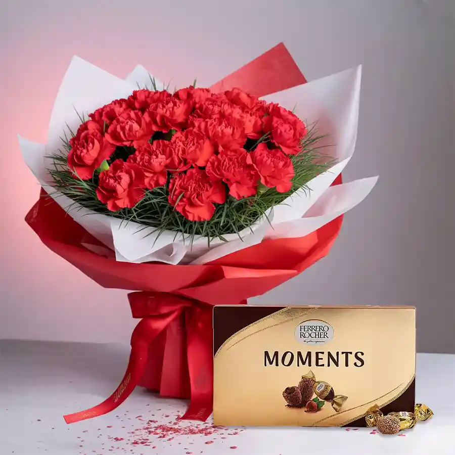 Bouquet of red carnations with Ferrero Rocher chocolates for Mother's Day.