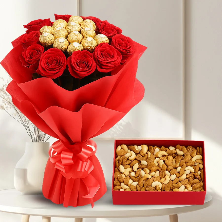 Bouquet of red roses, Ferrero Rocher chocolates, and a mixed dry fruits box, beautifully wrapped in red paper and ribbon.