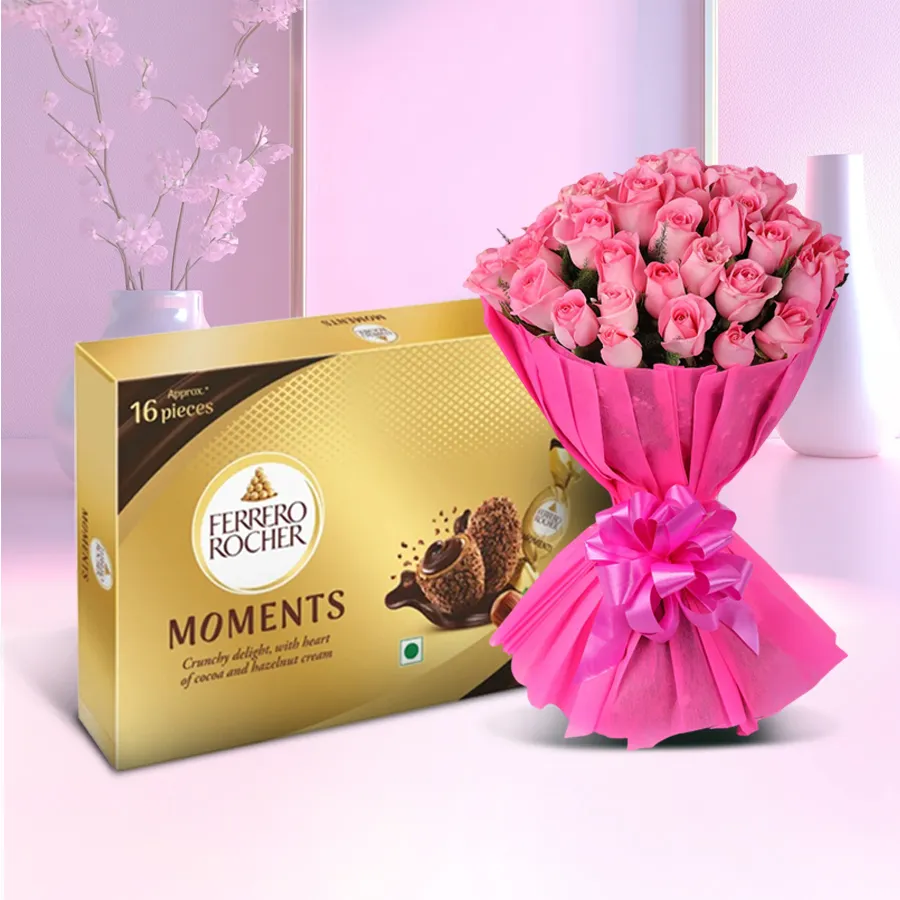 Charming pink roses bouquet with tissue and Ferrero Rocher chocolate box.