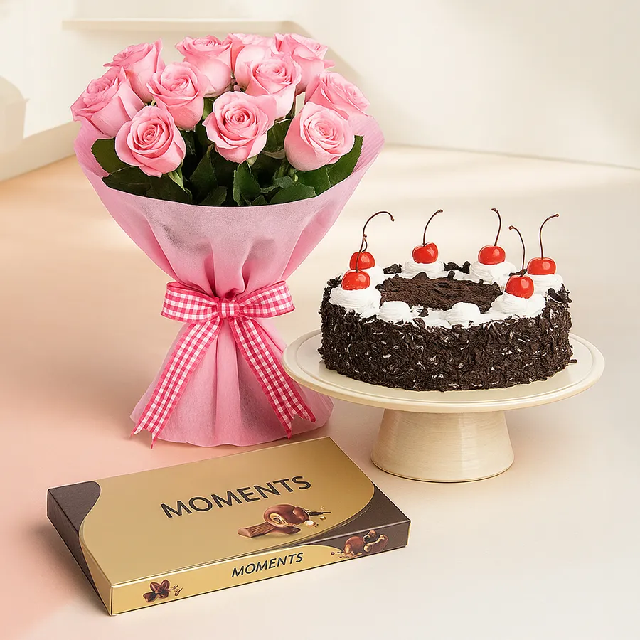 Delightful combo of Black Forest Cake, pink roses, and Ferrero Rocher chocolates.
