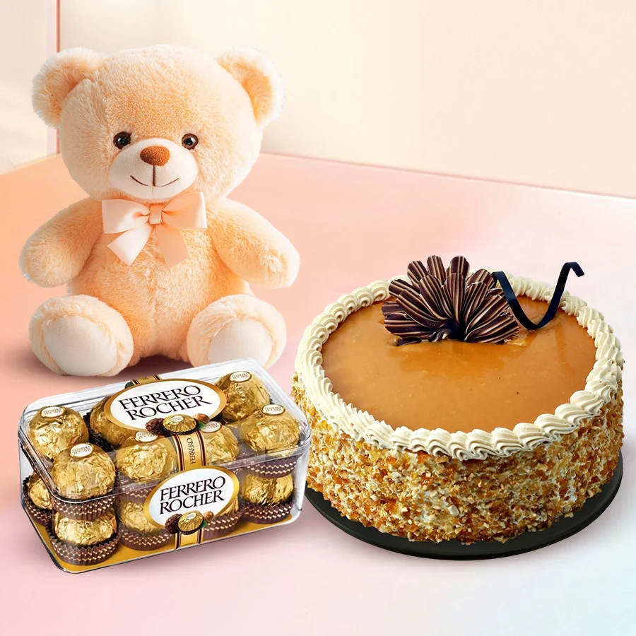 A delightful gift set featuring a butterscotch cake, Ferrero Rocher chocolates, and a cute teddy bear for special occasions.