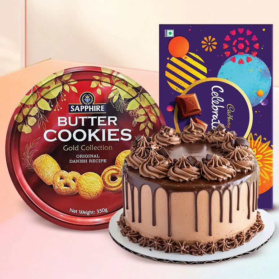 A delightful chocolate truffle cake, Cadbury chocolates, and butter cookies box, creating a blissful treat for any celebration.