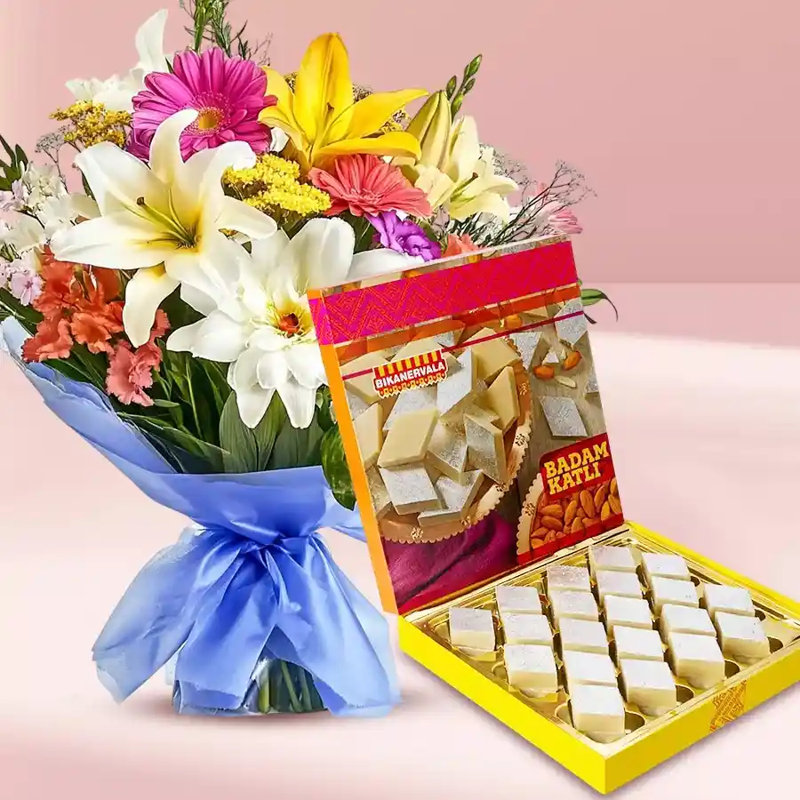 Bikanervalas Badam Katli with seasonal flower bouquet, gift for loved ones.