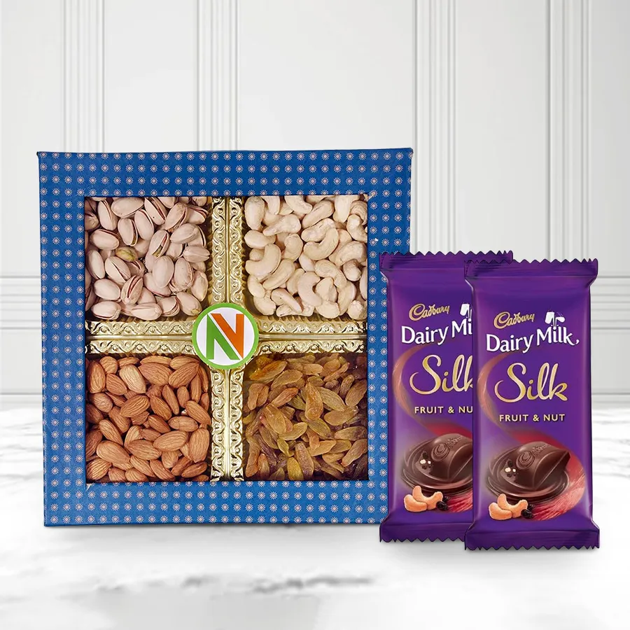 A beautiful gift box containing mixed dry fruits and Cadbury Dairy Milk Silk chocolates, perfect for sharing joy with loved ones.
