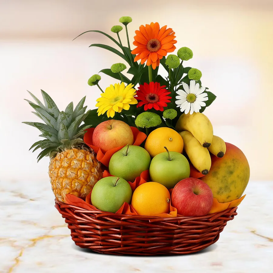 A vibrant basket filled with 2 kg of apples and pears, beautifully wrapped with a net and decorated with colorful Gerbera flowers.