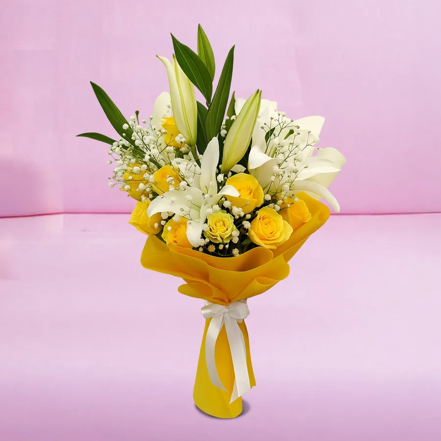 Radiant Blooms of Joy Bouquet featuring yellow roses and white lilies in a hand-tied arrangement.