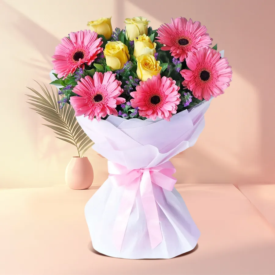 Tissue wrapped bouquet featuring 10 colorful gerberas and roses, perfect for gifting.