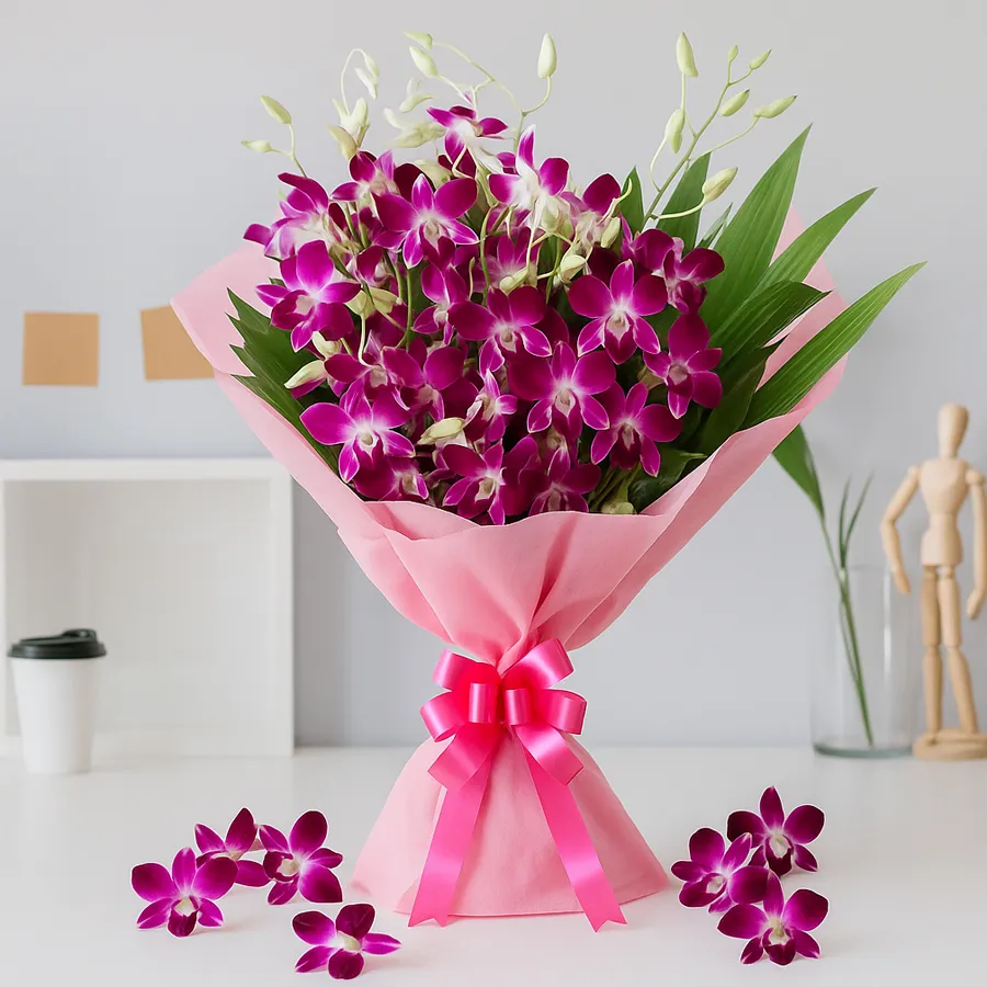 Beautiful Orchid Harmony Gift Bouquet with six stems tied with a ribbon and wrapped in tissue.