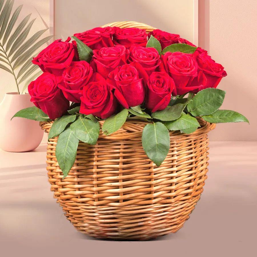 Arrangement of 10 red roses in an elegant basket, symbolizing timeless love and perfect for anniversaries.