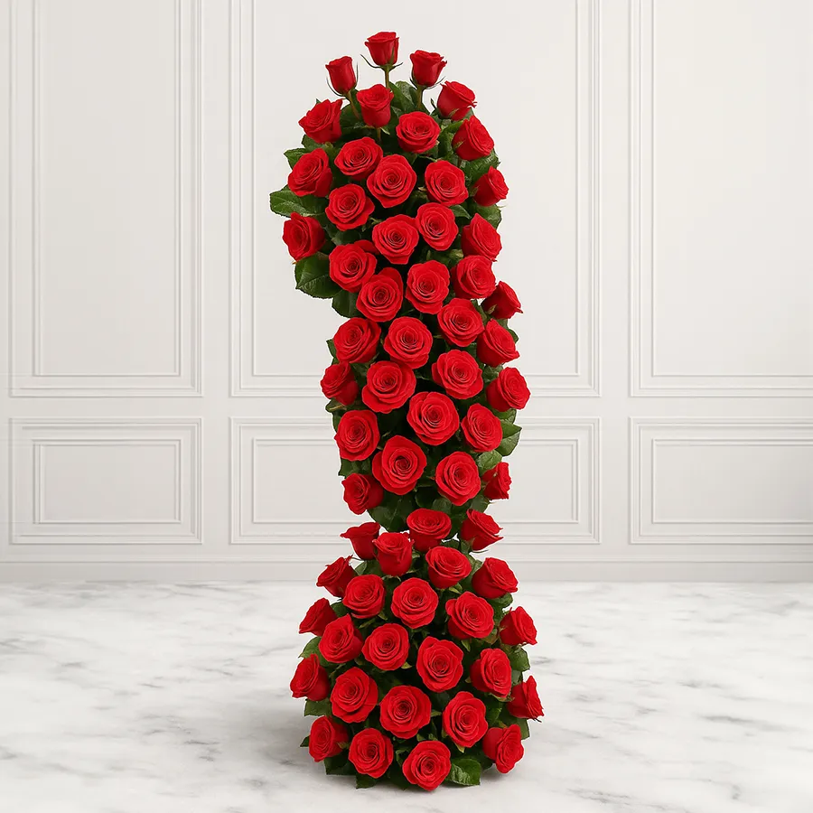 Awe-inspiring 5 ft long arrangement featuring 150 vibrant red roses, perfect for expressing love and affection.