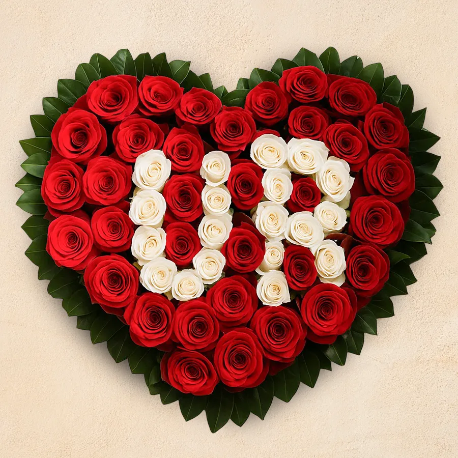 Heart-shaped arrangement of 100 red roses with customizable alphabet letter centerpiece.
