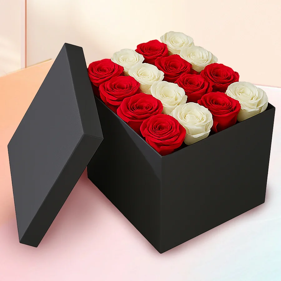 Square box filled with 30 red and white roses, symbolizing love.