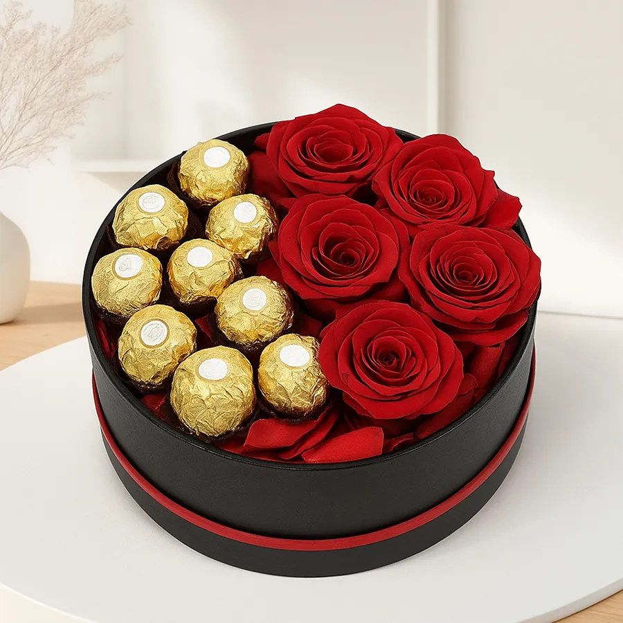 Amusing Ferrero Rocher and Red Roses Hat Box gift arrangement.