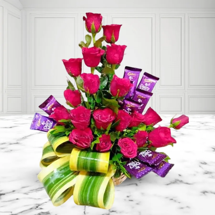 Exclusive arrangement of 21 red roses and 10 Cadbury chocolates for a 21st birthday celebration.