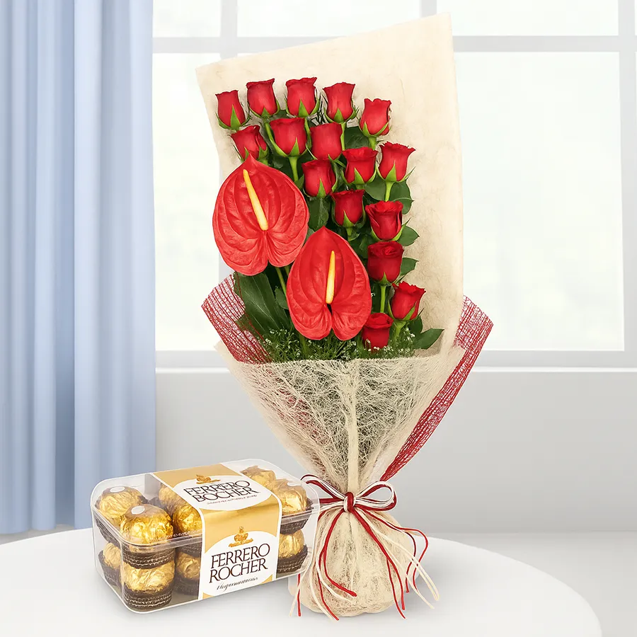 A beautiful bouquet of red roses and anthurium with a box of 16 Ferrero Rocher chocolates.