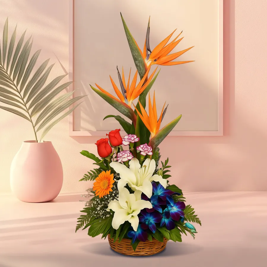 A vibrant flower basket featuring 19 assorted blooms including Bird of Paradise, Orange Roses, White Carnations, Blue Orchids, and more.