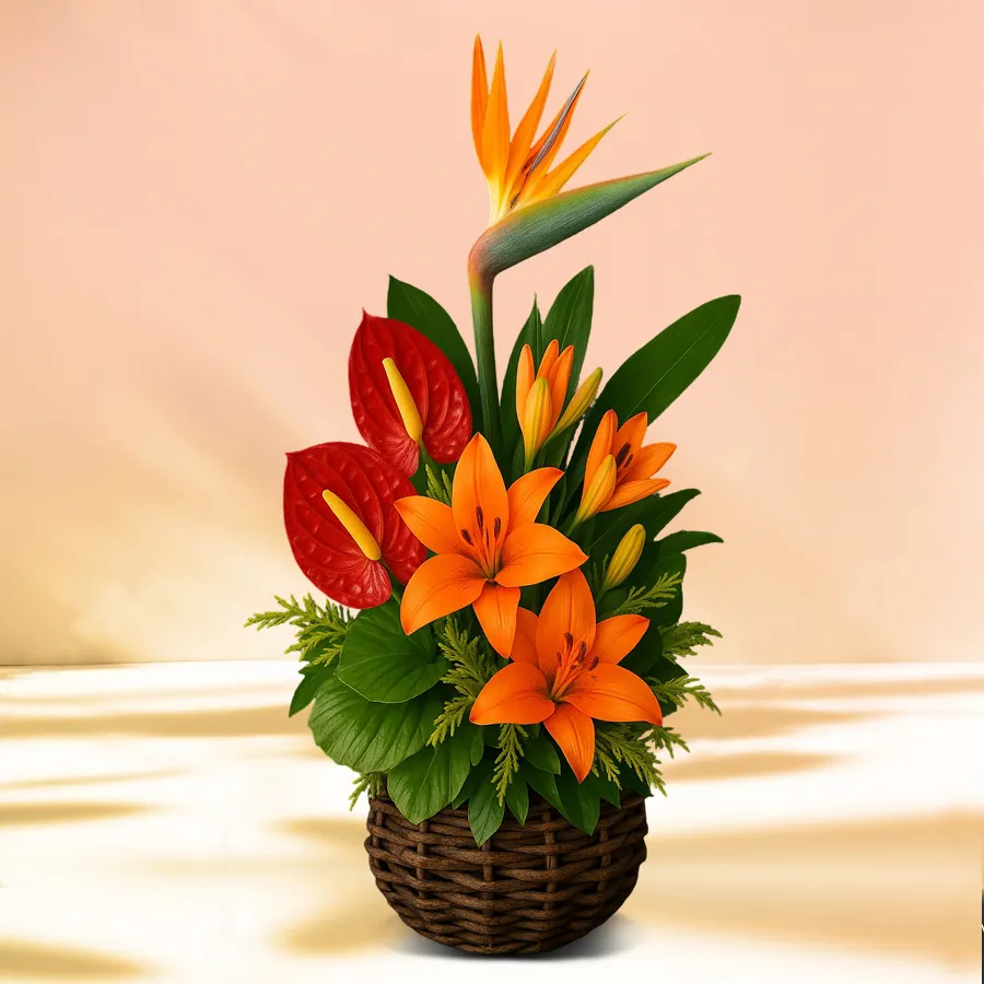 Exquisite Blossoms Gift Basket featuring assorted flowers like Birds of Paradise, Red Anthuriums, and Lilies arranged beautifully.