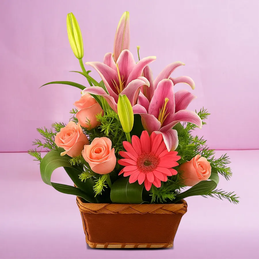 A charming basket filled with pink lilies, roses, and gerberas, perfect for expressing love and affection.