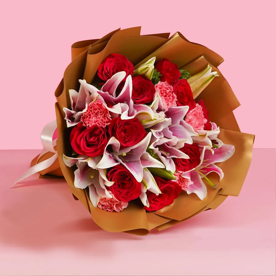 A beautiful bouquet featuring assorted roses and lilies, perfect for expressing love and affection.