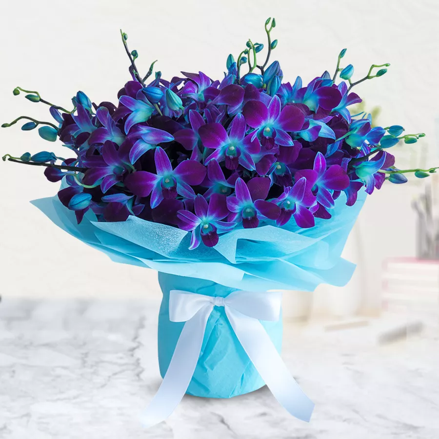 Bouquet featuring 8 vibrant blue orchids, perfect for gifting.