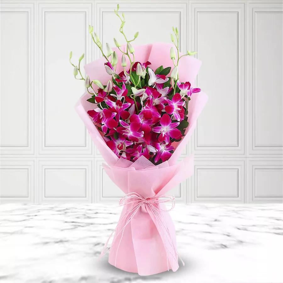Luxurious bouquet of six beautifully arranged orchids in vibrant colors.