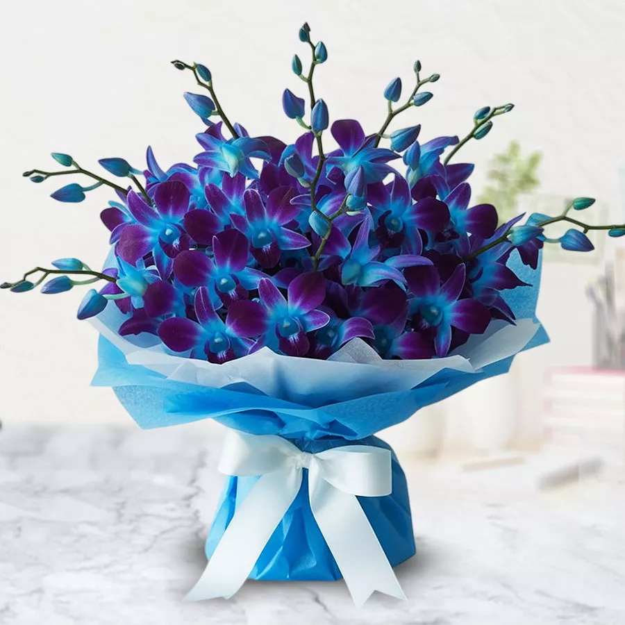 A stunning bouquet featuring 10 radiant blue orchids, perfect for heartfelt gifting.