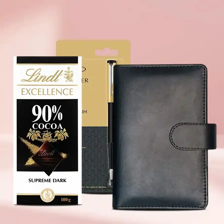 Set of chocolates, planner diary, and Parker Beta pen beautifully arranged in an elegant gift box.