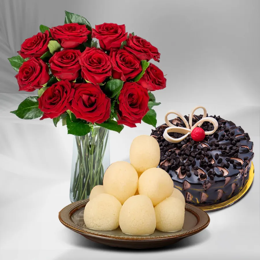 Romantic Roses and Sweet Treats Combo with red roses, chocolate cake, and canned rosogolla.